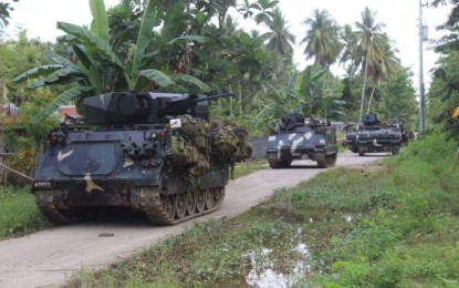 <p><strong>PURSUIT.</strong> Military tanks continue to advance towards positions of the IS-linked Bangsamoro Islamic Freedom Fighters in the interiors of Maguindanao on efforts to destroy the terror group. <em><strong>(Photo by 6ID))</strong></em></p>